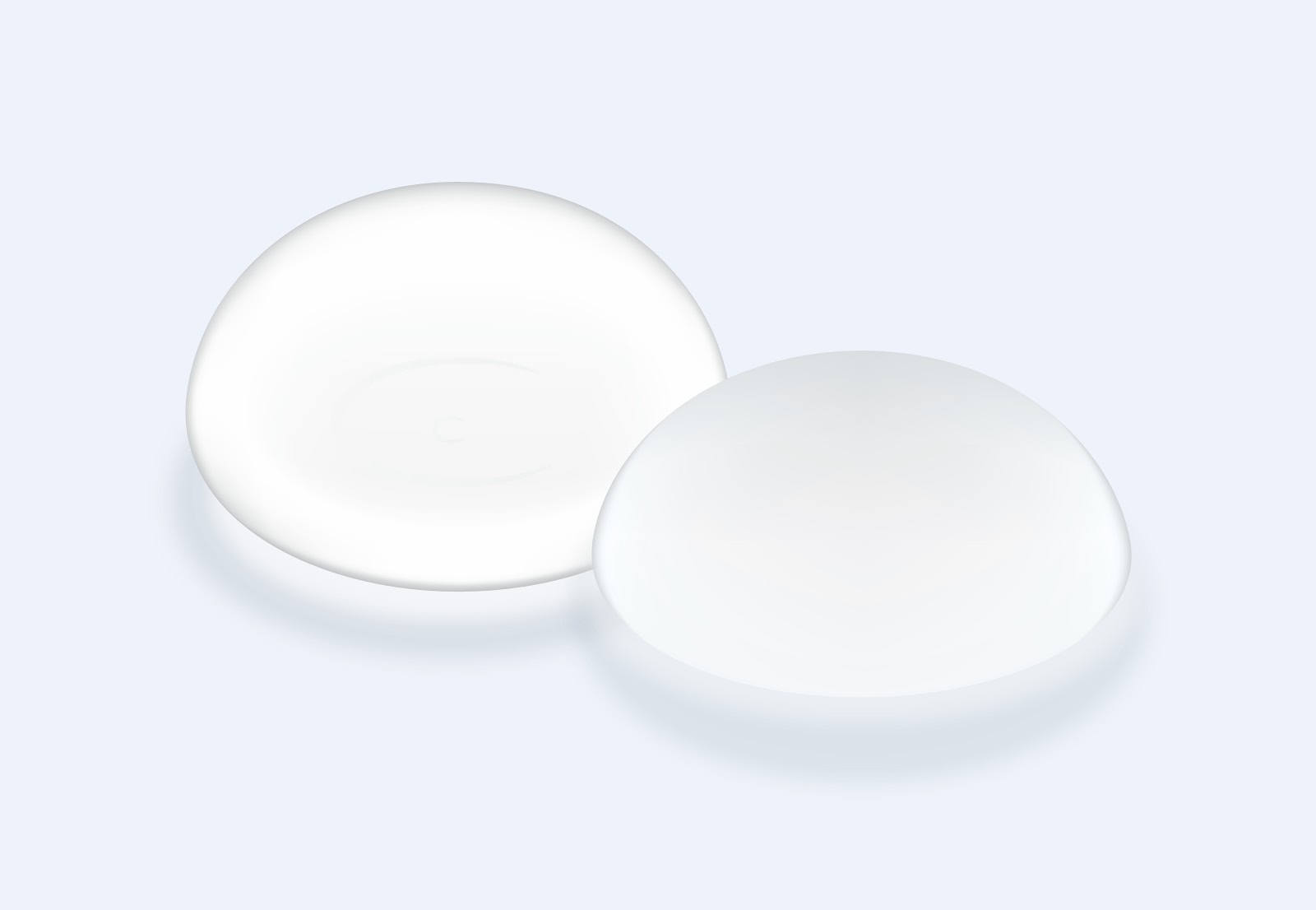 Drawing of two breast implants side by side on a blue-gray background.
